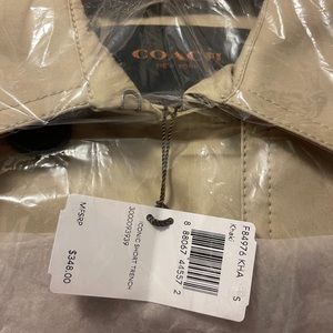 Coach iconic short trench